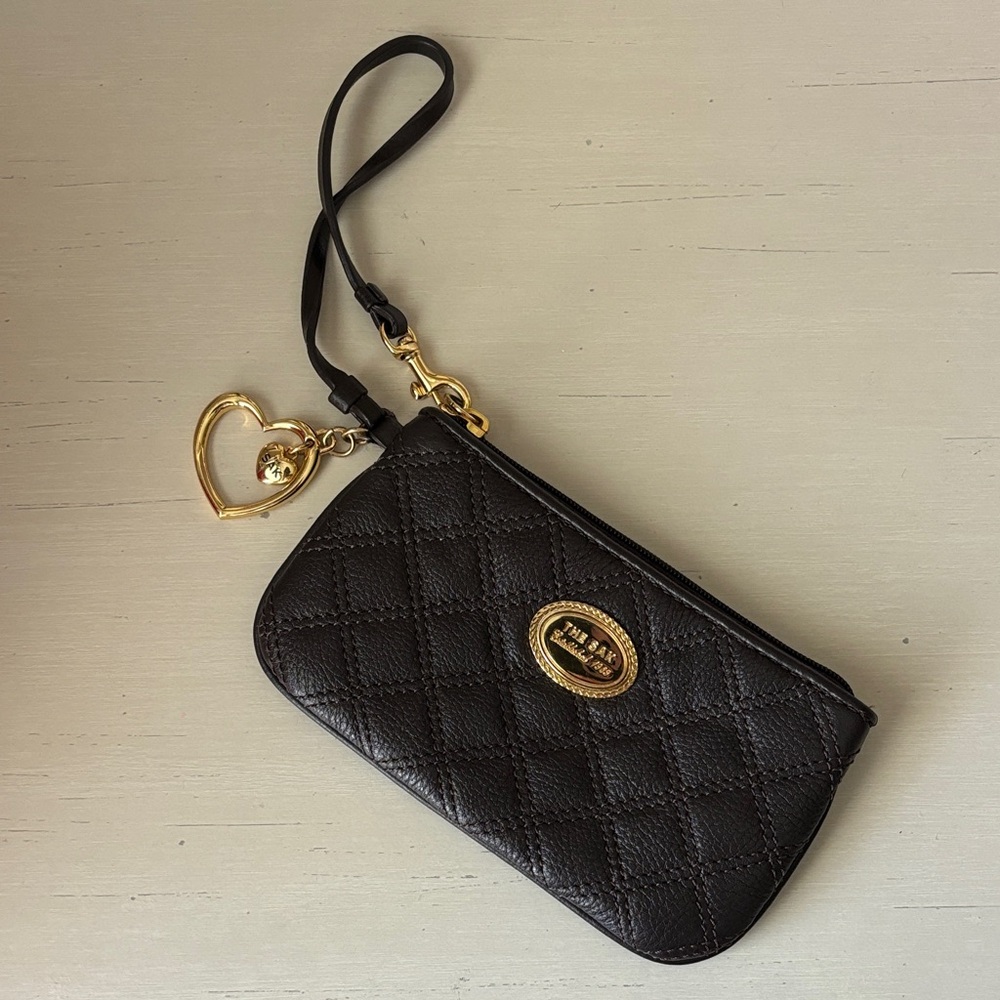 The Sak quilted leather heart charm wristlet wallet